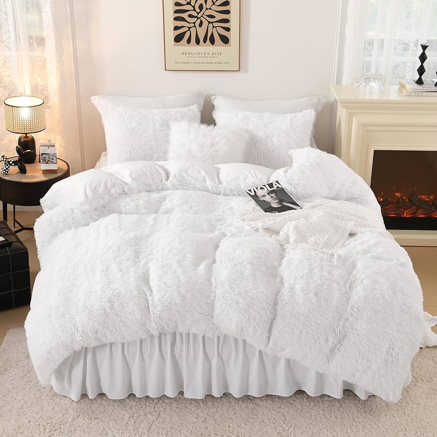 Clean white comforter on a bed