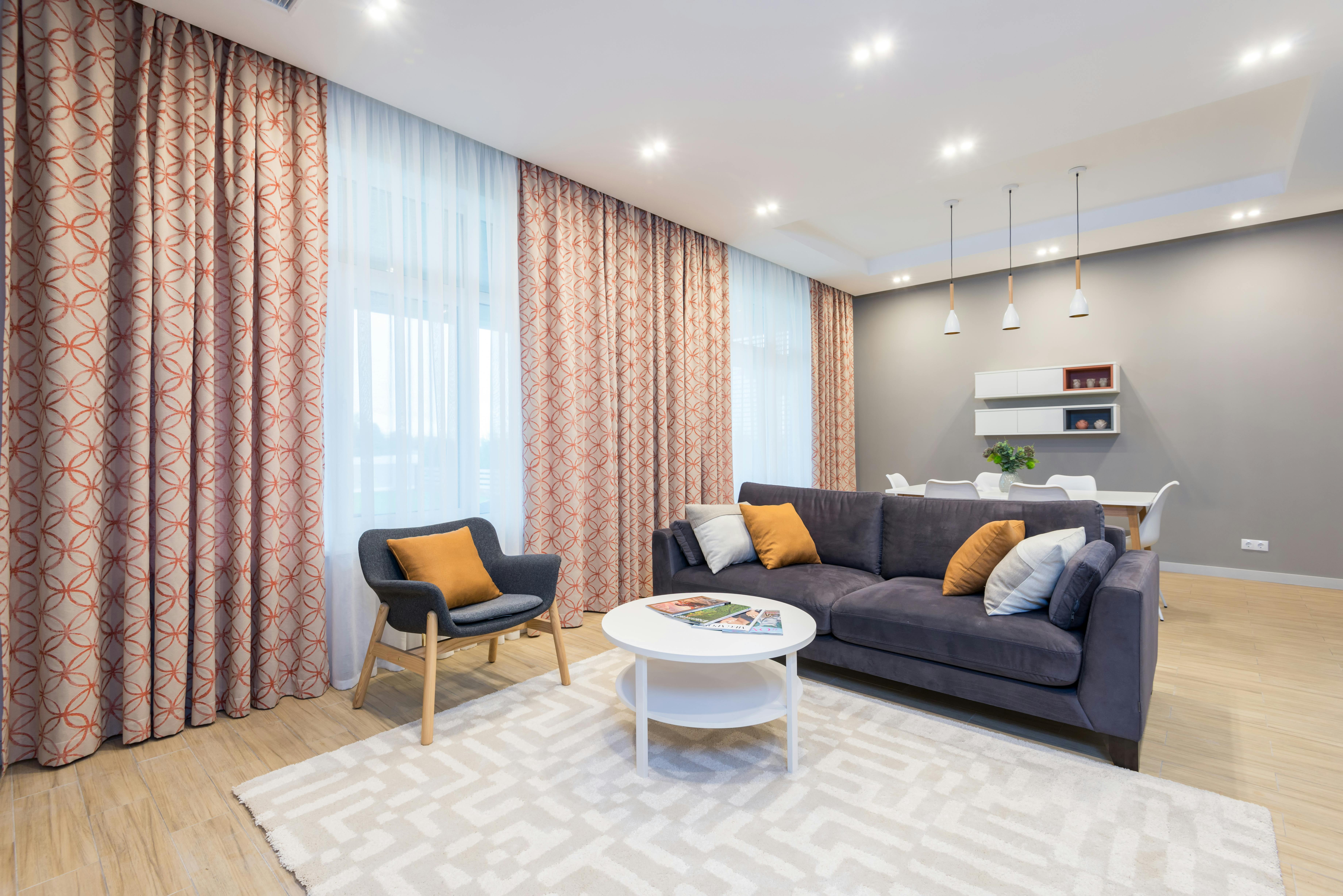 Clean white curtains and drapes on a window