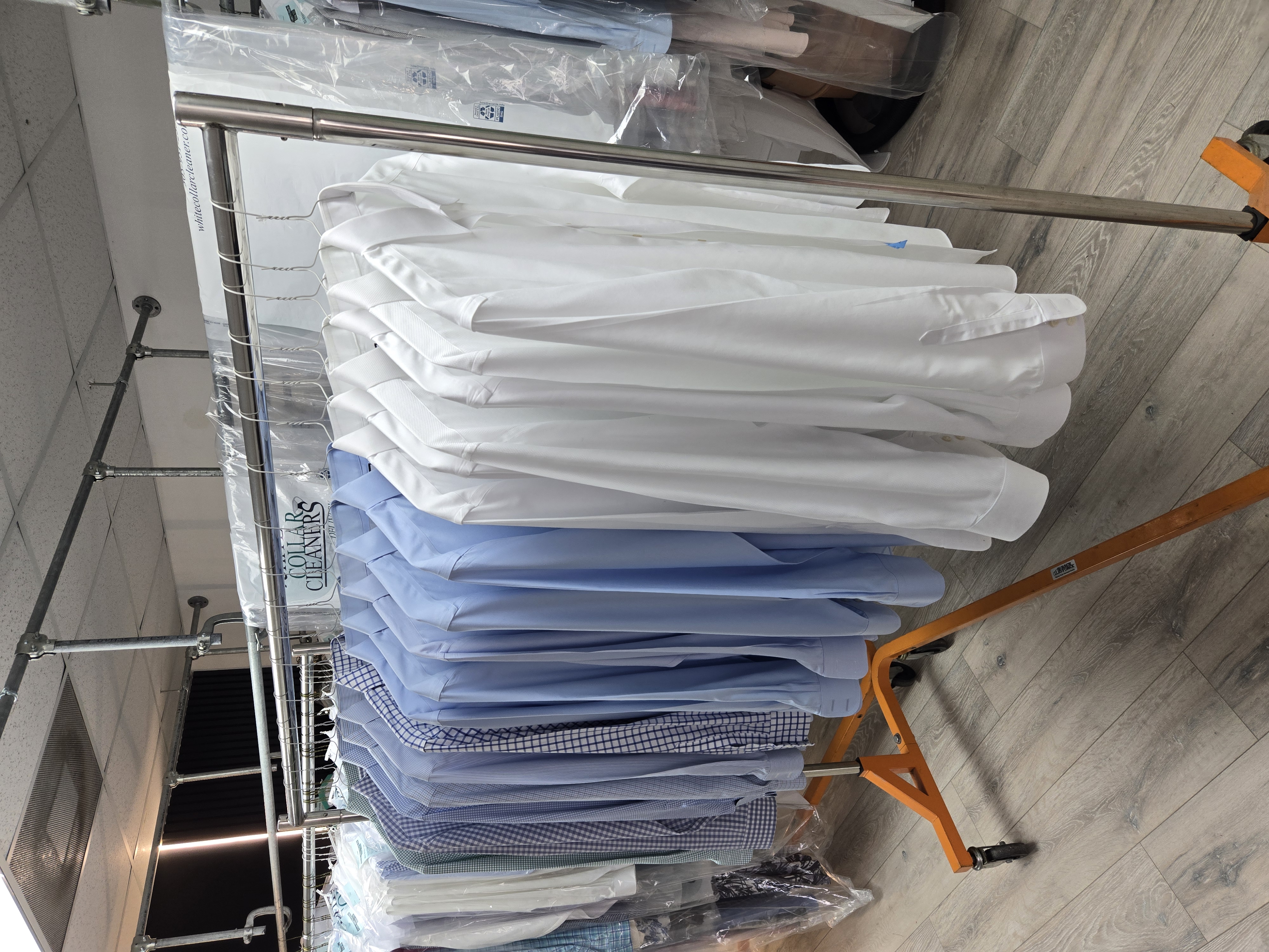 Neatly folded and pressed shirts ready for delivery