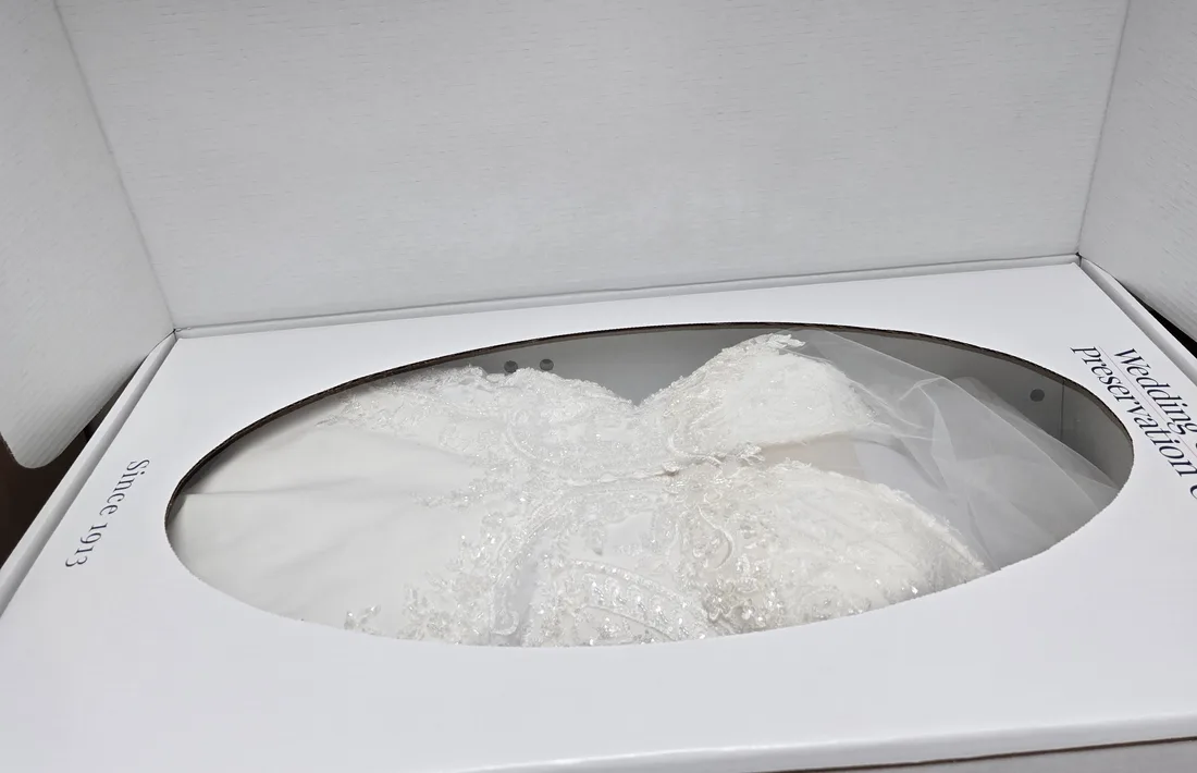 Wedding gown being prepared for cleaning and preservation
